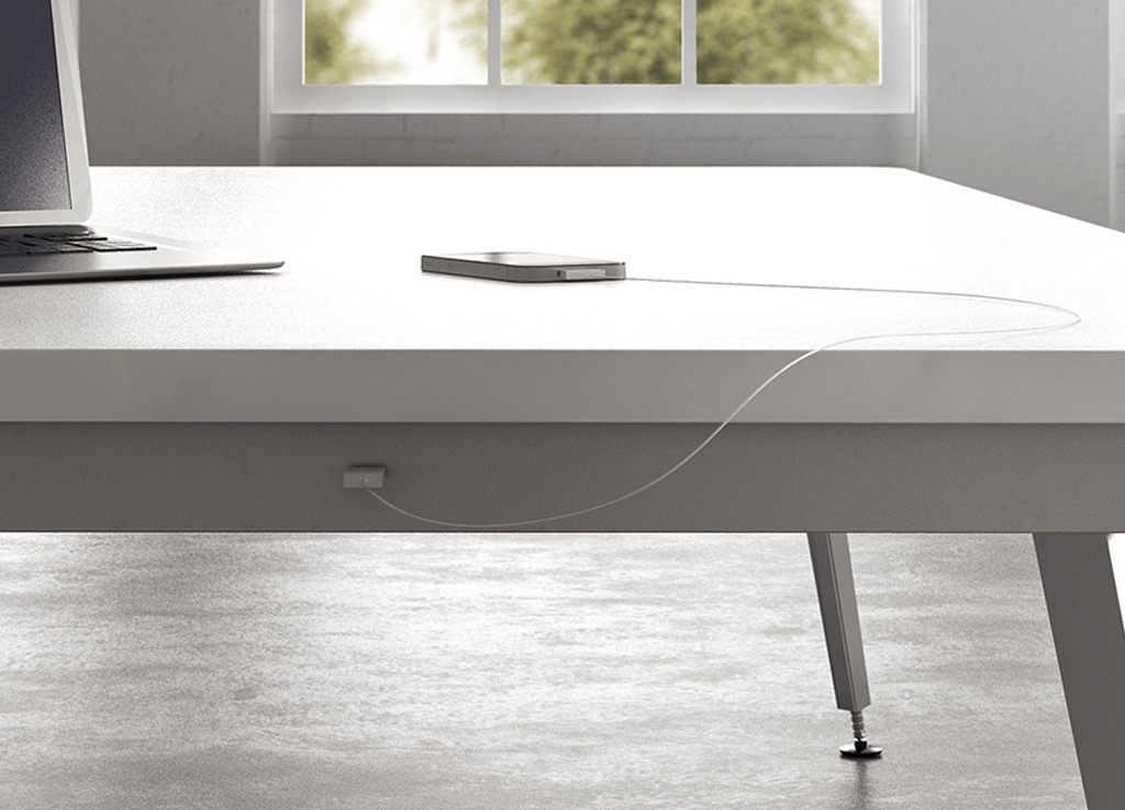 This boardroom furniture from OFS offers easy USB or 120V power access for every seat at the table without interrupting the minimal clean aesthetic of its environment. This boardroom furniture from OFS offers easy USB or 120V power access for every seat at the table without interrupting the minimal clean aesthetic of its environment.